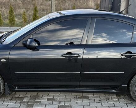 Черный Мазда 3, объемом двигателя 2 л и пробегом 154 тыс. км за 5500 $, фото 4 на Automoto.ua