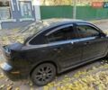 Черный Мазда 3, объемом двигателя 2 л и пробегом 218 тыс. км за 4000 $, фото 2 на Automoto.ua