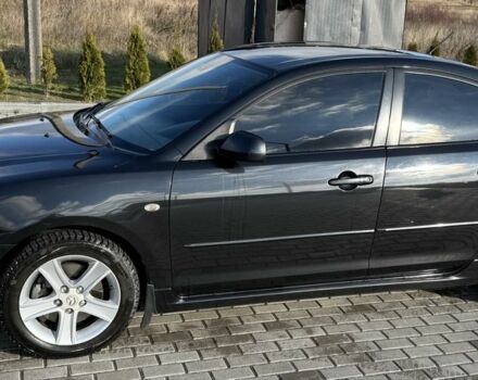 Черный Мазда 3, объемом двигателя 2 л и пробегом 154 тыс. км за 5500 $, фото 1 на Automoto.ua