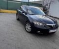Черный Мазда 3, объемом двигателя 1.6 л и пробегом 233 тыс. км за 5000 $, фото 1 на Automoto.ua