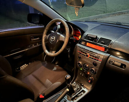 Черный Мазда 3, объемом двигателя 1.6 л и пробегом 208 тыс. км за 5500 $, фото 6 на Automoto.ua