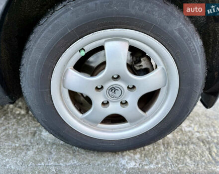 Черный Мазда 3, объемом двигателя 1.6 л и пробегом 210 тыс. км за 3950 $, фото 17 на Automoto.ua