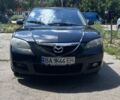 Черный Мазда 3, объемом двигателя 1.6 л и пробегом 203 тыс. км за 5600 $, фото 1 на Automoto.ua