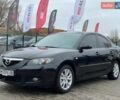 Черный Мазда 3, объемом двигателя 1.6 л и пробегом 276 тыс. км за 5555 $, фото 1 на Automoto.ua