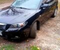 Черный Мазда 3, объемом двигателя 2 л и пробегом 240 тыс. км за 5600 $, фото 6 на Automoto.ua