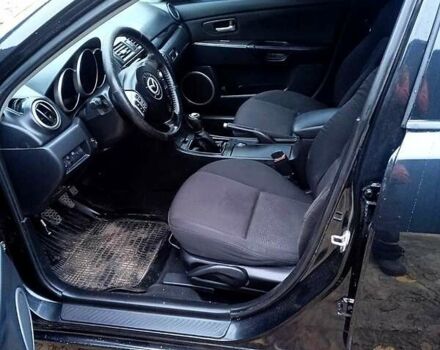 Черный Мазда 3, объемом двигателя 2 л и пробегом 240 тыс. км за 5600 $, фото 16 на Automoto.ua