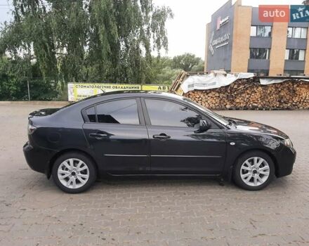 Черный Мазда 3, объемом двигателя 1.6 л и пробегом 183 тыс. км за 5800 $, фото 4 на Automoto.ua
