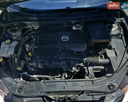 Черный Мазда 3, объемом двигателя 1.6 л и пробегом 208 тыс. км за 5500 $, фото 9 на Automoto.ua