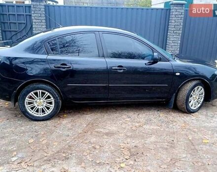 Черный Мазда 3, объемом двигателя 2 л и пробегом 240 тыс. км за 5600 $, фото 13 на Automoto.ua