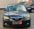 Черный Мазда 3, объемом двигателя 1.6 л и пробегом 232 тыс. км за 6740 $, фото 1 на Automoto.ua