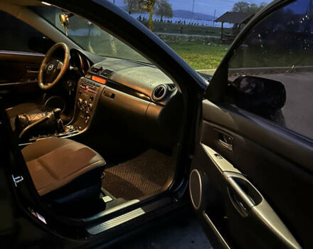 Черный Мазда 3, объемом двигателя 1.6 л и пробегом 208 тыс. км за 5500 $, фото 5 на Automoto.ua