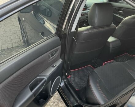 Черный Мазда 3, объемом двигателя 2 л и пробегом 166 тыс. км за 6000 $, фото 9 на Automoto.ua