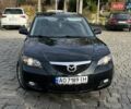 Черный Мазда 3, объемом двигателя 1.6 л и пробегом 180 тыс. км за 5700 $, фото 1 на Automoto.ua
