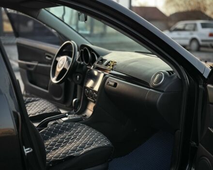 Черный Мазда 3, объемом двигателя 1.6 л и пробегом 290 тыс. км за 4400 $, фото 11 на Automoto.ua