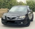 Черный Мазда 3, объемом двигателя 1.6 л и пробегом 200 тыс. км за 5900 $, фото 1 на Automoto.ua