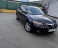 Чорний Мазда 3, об'ємом двигуна 1.6 л та пробігом 233 тис. км за 5299 $, фото 1 на Automoto.ua