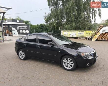Черный Мазда 3, объемом двигателя 1.6 л и пробегом 183 тыс. км за 5800 $, фото 1 на Automoto.ua