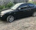 Черный Мазда 3, объемом двигателя 2 л и пробегом 119 тыс. км за 8000 $, фото 1 на Automoto.ua