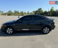 Черный Мазда 3, объемом двигателя 2 л и пробегом 150 тыс. км за 5999 $, фото 1 на Automoto.ua