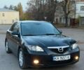 Черный Мазда 3, объемом двигателя 1.6 л и пробегом 225 тыс. км за 4499 $, фото 1 на Automoto.ua