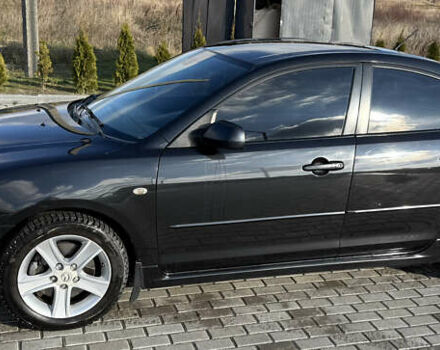 Черный Мазда 3, объемом двигателя 2 л и пробегом 154 тыс. км за 5500 $, фото 1 на Automoto.ua