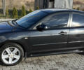 Черный Мазда 3, объемом двигателя 2 л и пробегом 154 тыс. км за 5500 $, фото 1 на Automoto.ua