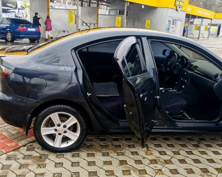 Чорний Мазда 3, об'ємом двигуна 1.6 л та пробігом 235 тис. км за 5600 $, фото 4 на Automoto.ua