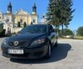 Черный Мазда 3, объемом двигателя 1.6 л и пробегом 250 тыс. км за 6000 $, фото 1 на Automoto.ua
