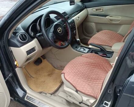 Черный Мазда 3, объемом двигателя 1.6 л и пробегом 232 тыс. км за 5850 $, фото 9 на Automoto.ua