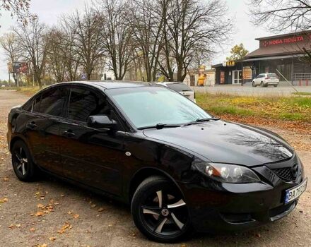 Чорний Мазда 3, об'ємом двигуна 1.6 л та пробігом 289 тис. км за 4600 $, фото 7 на Automoto.ua