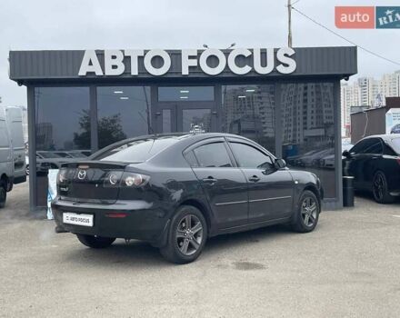 Чорний Мазда 3, об'ємом двигуна 1.6 л та пробігом 223 тис. км за 6490 $, фото 6 на Automoto.ua