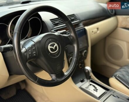 Чорний Мазда 3, об'ємом двигуна 1.6 л та пробігом 268 тис. км за 5750 $, фото 12 на Automoto.ua