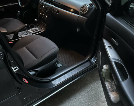 Чорний Мазда 3, об'ємом двигуна 1.6 л та пробігом 177 тис. км за 6100 $, фото 9 на Automoto.ua