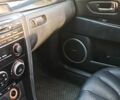 Черный Мазда 3, объемом двигателя 2 л и пробегом 250 тыс. км за 5300 $, фото 5 на Automoto.ua