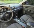 Черный Мазда 3, объемом двигателя 2 л и пробегом 187 тыс. км за 5200 $, фото 4 на Automoto.ua