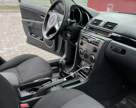 Черный Мазда 3, объемом двигателя 1.6 л и пробегом 189 тыс. км за 4500 $, фото 18 на Automoto.ua