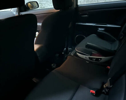 Чорний Мазда 3, об'ємом двигуна 1.6 л та пробігом 177 тис. км за 6100 $, фото 14 на Automoto.ua