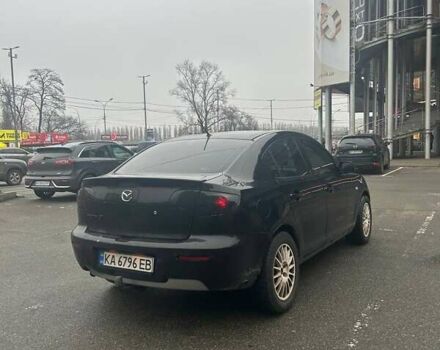 Черный Мазда 3, объемом двигателя 1.6 л и пробегом 218 тыс. км за 3900 $, фото 1 на Automoto.ua