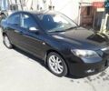 Черный Мазда 3, объемом двигателя 1.6 л и пробегом 261 тыс. км за 5900 $, фото 1 на Automoto.ua