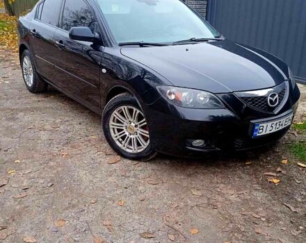 Черный Мазда 3, объемом двигателя 2 л и пробегом 240 тыс. км за 5600 $, фото 2 на Automoto.ua