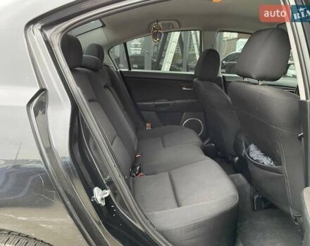 Чорний Мазда 3, об'ємом двигуна 1.6 л та пробігом 223 тис. км за 6490 $, фото 9 на Automoto.ua