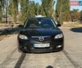 Черный Мазда 3, объемом двигателя 2 л и пробегом 218 тыс. км за 4700 $, фото 1 на Automoto.ua
