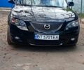 Черный Мазда 3, объемом двигателя 1.6 л и пробегом 230 тыс. км за 4750 $, фото 1 на Automoto.ua