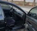 Черный Мазда 3, объемом двигателя 1.6 л и пробегом 153 тыс. км за 6200 $, фото 21 на Automoto.ua