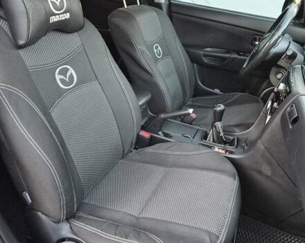 Чорний Мазда 3, об'ємом двигуна 1.6 л та пробігом 253 тис. км за 5200 $, фото 23 на Automoto.ua