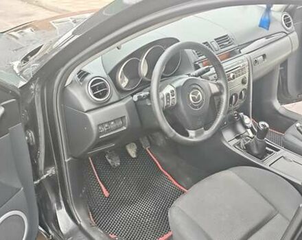Черный Мазда 3, объемом двигателя 1.6 л и пробегом 205 тыс. км за 5600 $, фото 2 на Automoto.ua