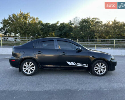 Чорний Мазда 3, об'ємом двигуна 2 л та пробігом 200 тис. км за 2950 $, фото 6 на Automoto.ua