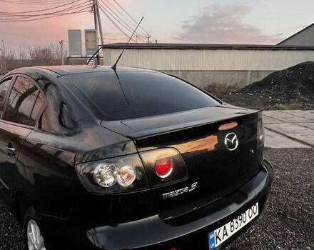 Черный Мазда 3, объемом двигателя 1.6 л и пробегом 153 тыс. км за 6200 $, фото 1 на Automoto.ua