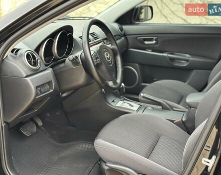 Черный Мазда 3, объемом двигателя 1.6 л и пробегом 130 тыс. км за 7700 $, фото 34 на Automoto.ua