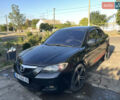 Черный Мазда 3, объемом двигателя 2 л и пробегом 224 тыс. км за 6400 $, фото 1 на Automoto.ua